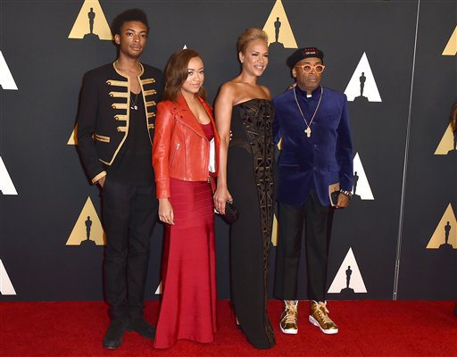 Spike Lee, from right, Tonya Lewis Lee, Satchel Lee and Jackson Lee arrive at the Governors Awards at the Dolby Ballroom on Saturday, Nov. 14, 2015, in Los Angeles. (Photo by Jordan Strauss/Invision/AP)